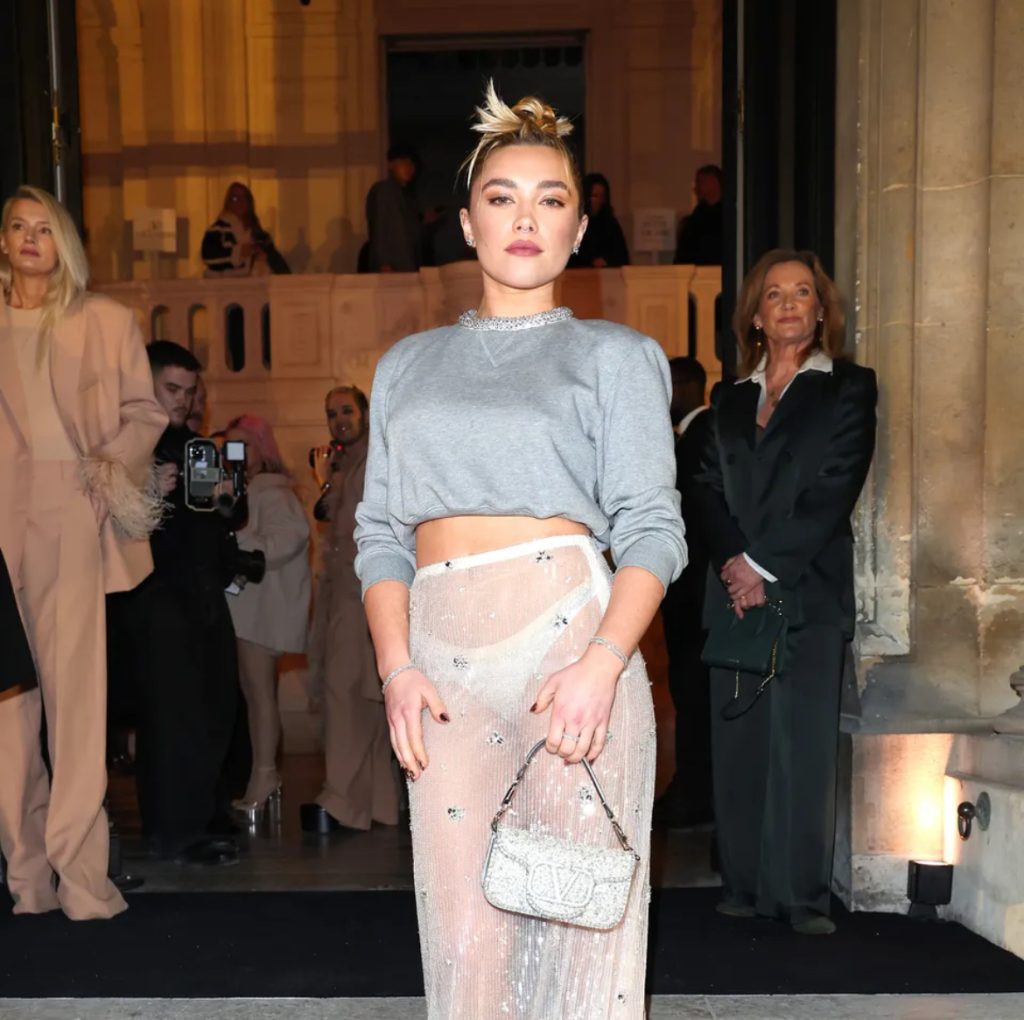 Florence Pugh at the Valentino Show wearing a naked skirt